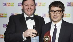 Shetland News reporter Neil Riddell (right) collecting one of two awards from Keith Miller of the main sponsor of the media awards event, drinks company Diageo - Photo: Lucid PR