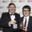 Shetland News reporter Neil Riddell (right) collecting one of two awards from Keith Miller of the main sponsor of the media awards event, drinks company Diageo - Photo: Lucid PR