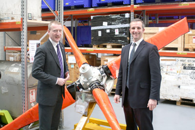 Tavish Scott (left) and Liam McArthur at Loganair's Glasgow spares hub on Wednesday.