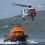 One of the Sumburgh based search and rescue helicopters exercising with the Aith lifeboat - Photo: Bristow Helicopters