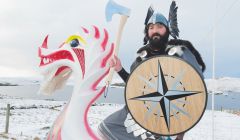 Nesting and Girlsta Jarl Mark Gifford on his galley Sneckan reviving the red and white colours from his grandfather Charlie Anderson's day. Photo Malcolm Younger/Millgaet Media