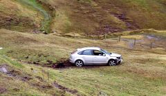 The silver Ford Focus went down the embankment near the Black Gaet junction - Photo: ShetNews