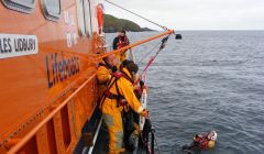 Elizabeth Atia in the water during a woman overboard exercise with the Aith lifeboat.