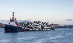 Sans Vitesse being towed out of Lerwick harbour on Thursday evening by the council's Sullom Voe tug Tystie. Photo Platform Shetland