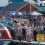 Cruise passengers step ashore on the new pontoons at Lerwick's Victoria Pier. Photo LPA