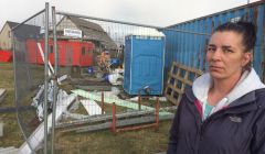Mandie Fulbirg outside the building site surrounding her house on Stucco in Hillswick. Photo Shetnews