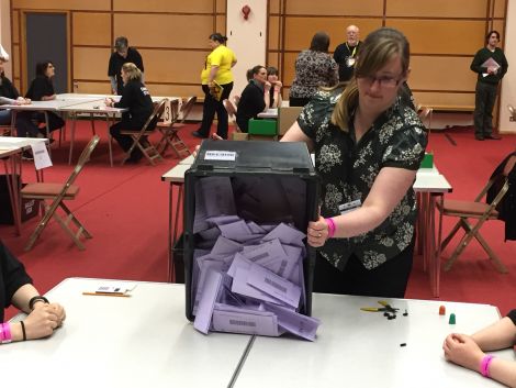 Some of the first Lerwick ballot papers being emptied out for counting.