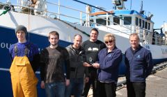 Ian Shearer (centre) receiving his award from Caroline Hepburn of the NAFC Marine Centre. Also in the photo are (from left) Christopher Irvine, Malcolm Reid, Davie Shearer and Leslie Tait. Photo: NAFC