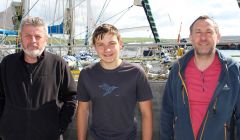 The Northabout crew visiting Shetland ahead of their circumpolar journey include (from left) skipper Nikolay Litau, Benjamin Edwards and his father Steve Edwards.
