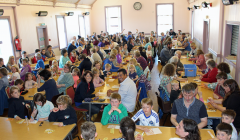 Locals and visitors alike enjoying the bingo at the Baltasound Hall.