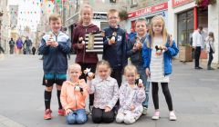 From back left to front right: Jayden Wiseman (7), competition winner Kayla Shearer (10), Cory Burgess (9), Joe Robinson (6), Shannon Burgess (7), Conner Burgess (4), Thea Williamson (5), Mia Wiseman (5). Photo: Ben Mullay.