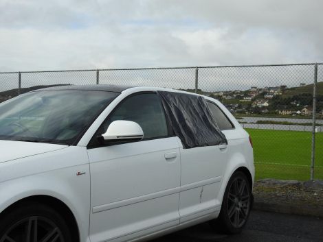 the smashed car window is now being handled as an insurance claim.