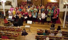A pop-up choir earlier this month raised £1,500 for the 'From Shetland With Love' charity. Photo: Dale Smith