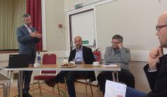 Robert Thorburn of BT addressing the digital forum meeting in Skeld on Saturday, as O2's Paul James and HIE's Stuart Robertson look on.