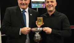 Trevor Tulloch (right) was presented with his two awards by Colin McKinnon, operations director for Robertson Construction Northern