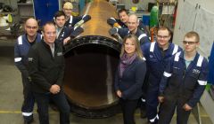 John Henderson, MD of Ocean Kinetics Limited (left) and Katrina Wiseman HIE (right) seen here with staff at Ocean Kinetics - Photo: Ben Mullay.HIE