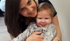 Paula with James, who is receiving treatment for retinoblastoma.