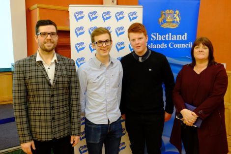 Newly elected MSYPs Sonny Thomason (second from left) and Charlie Haddon (third from left) with Martin Summers of Shetland Islands Council (left) and deputy returning officer Anne Cogle. Photo: SIC.
