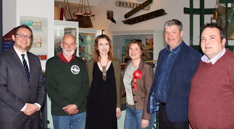 Five of the six candidates followed the BBC invitation for the hustings in the Shetland Museum and Archive. From left to right: BBC journalist Daniel Lawson; Stuart Hill, independent; Miriam Brett, SNP; Robina Barton, Labour; Alistair Carmichael, Lib Dems; and Jamie Halco Johnston, Tories. All photos Chris Cope/Shetland News