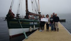 Members of the Swan Trust receiving a cheque for £3,000 from Aith pupils earlier this week. Photo courtesy of the Swan Trust.