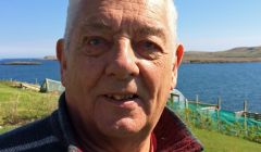 One-time Liberal Democrat councillor Peter Malcolmson has called on islanders to support SNP candidate Miriam Brett.