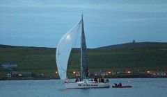 The crew of the Winocean receiving the Blue ribbon for the fastest crossing. Photo: Shetland Race Committee