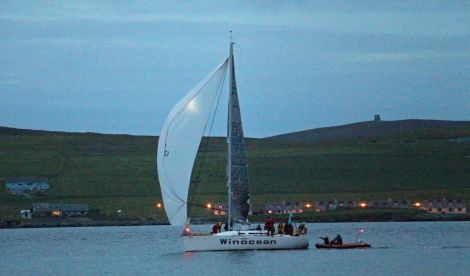 The crew of the Winocean receiving the Blue ribbon for the fastest crossing. Photo: Shetland Race Committee