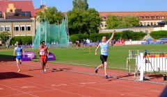 Seumas Mackay celebrates crossing the line to win gold in the men's 800 metres in Gotland on Tuesday. Photo: Shetland Island Games Association.