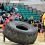 Shetland's new strongest man Jonni Manson in action during the tyre flip event. Photo: Mark Berry