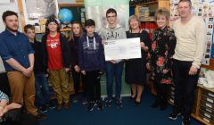 The winning team being handed a cheque from YPI. L-R: Kris Johnson, Luke Dutch, Alex Jamieson, Zoe Rivett, Kamran Irvani, Dougie Smith, Moira Bell, Helen Budgen, and Andy Paterson. Photo: Dave Donaldson