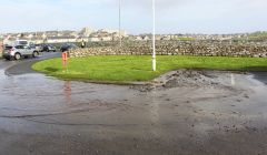Water flooded the entrance to the car park. Photo: Chris Cope/Shetland News