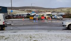 The road is closed between the roundabout at the bottom of Staney Hill and Leask Motor Garage. Photo: Shetland News