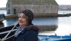 Elizabeth Johnston wearing the Shetland Wool Week 2018 hat.