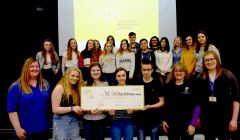 Left to right: Laura Russell (Shetland Befriending Scheme), S3 pupils Leah Johnson, Jayden Grant, Abby Sandison and Igor Gazda, Mairi Jamieson (Shetland Befriending Scheme), Cheryl Cluness, English teacher. Back row: YPI finalists from all S3 classes. Photo: SIC