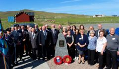 Representatives from the RAF, RAFA, the Reid and Irwin families join Cunningsburgh History Group and the day's speakers. Photos: Chris Cope/Shetland News