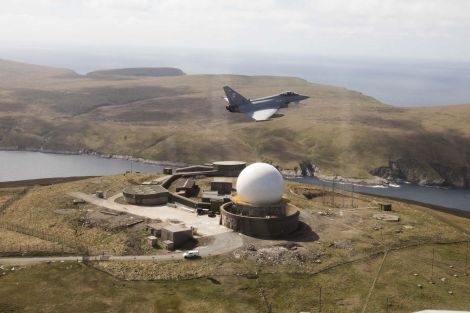 The Typhoon jet flying over the Saxa Vord radar base. Photo: MoD
