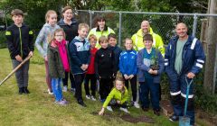 From back left to right: Bell's Brae eco committee teacher Sophie Thouless, Lerwick Port Authority HSEQ assistant Amy Inkster and Stuart Wadley, Shetland Amenity Trust woodlands foreman Paul Goddard with Bell's Brae P2-P7 school pupils. Photo: John Coutts