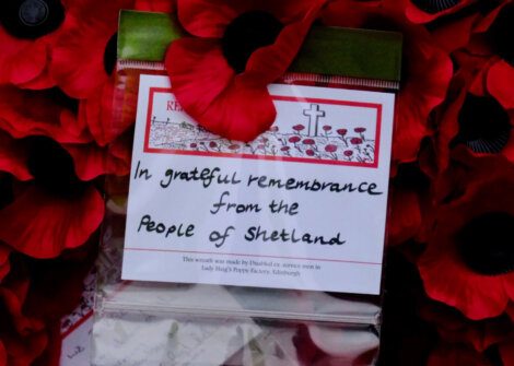 A red poppy with a message on it.