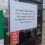 A sign on a fuel pump reads, "We regret that our 24 hour self service fuel pumps are not open this weekend due to a local shortage of fuel. We are sorry for any inconvenience.