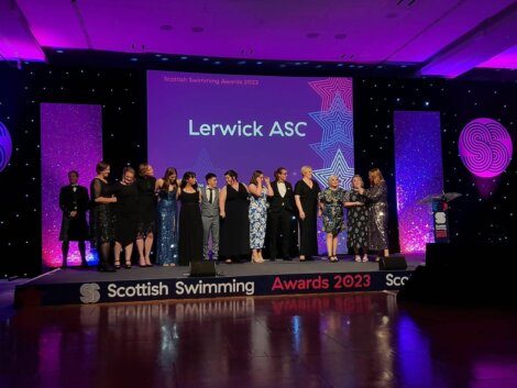 Group of individuals on stage at the scottish swimming awards 2023.