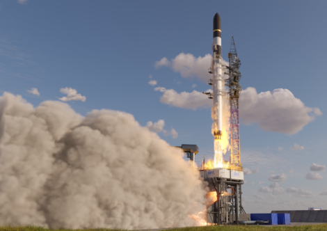 A rocket is taking off with smoke coming out of it.