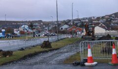 A construction crew is working on a road.