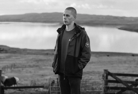 A man standing in a field.