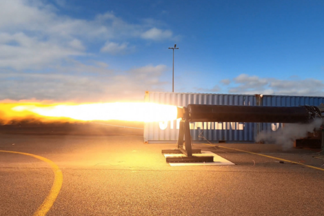 A rocket is being fired out of a container.