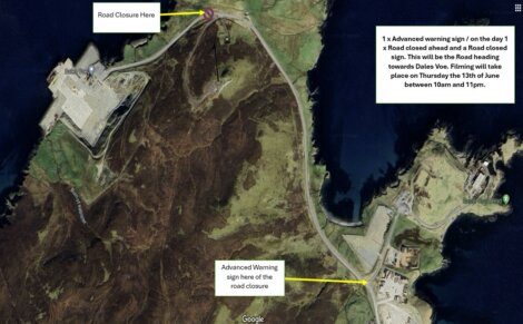Satellite image showing a road closure area with two labeled points for placement of road signs. The signs indicate an advanced warning of filming on Thursday, June 13th, between 10 AM and 11 PM.