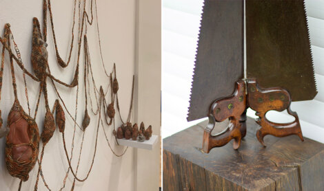 Left: Hanging wire and stone art installation. Right: Two antique saws with ornate handles displayed on a wooden base.