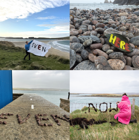 Four images with words spelled out: "EVEN" on a flag, "HERE" on a painted rock, "EVEN" with stones on a path, and "NOW" on a fence. Each scene depicts coastal landscapes and rocky or grassy terrain.