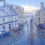 A snow-dusted street scene at Market Cross shows parked cars, historic buildings, and a central monument on a clear day.