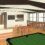 A recreation room with a pool table, tables and chairs, potted plants, large windows, a wall-mounted TV, and double wooden doors.
