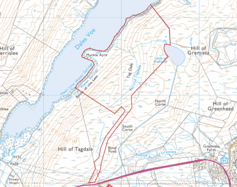 Topographic map showing the Dales Voe area with contour lines, water bodies, and labeled locations. A red outlined path or boundary crosses hills, fields, and water features.